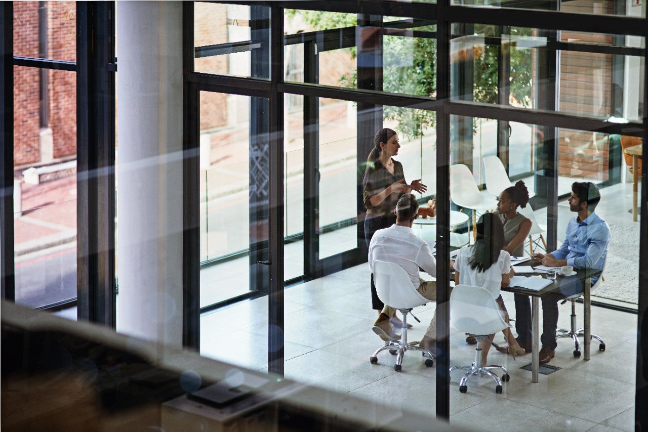 Shot of a group of businesspeople having a meeting in a boardroom.