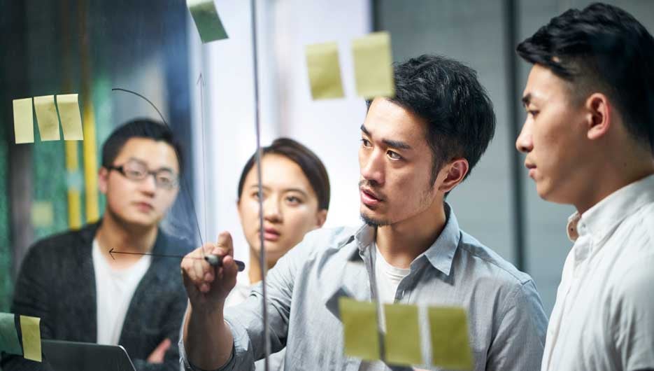 young asian business team people meeting in office